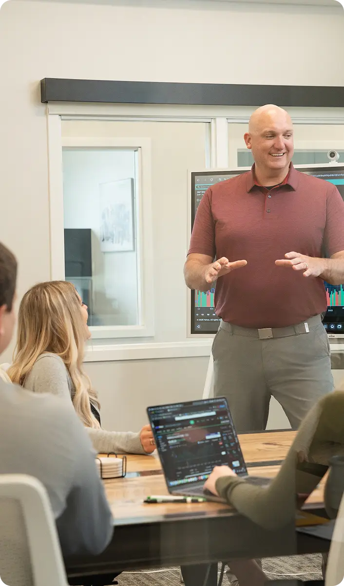 SD Capital co-founder leading a financial planning meeting in office